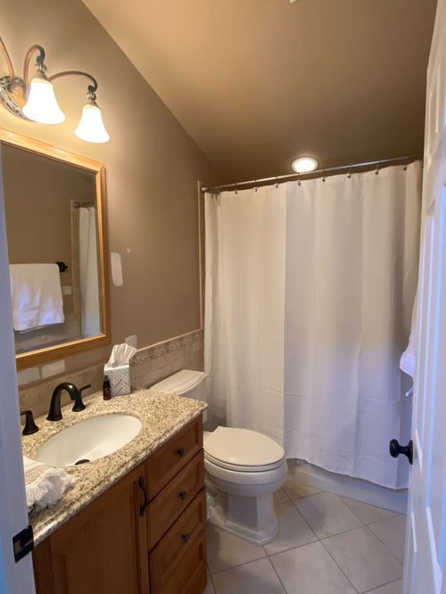 ideas to spruce up bathroom on a budget?