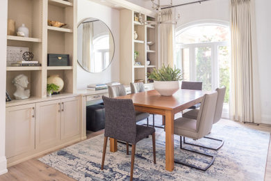 Kitchen/dining room combo - mid-sized modern medium tone wood floor and gray floor kitchen/dining room combo idea in Toronto with beige walls and no fireplace