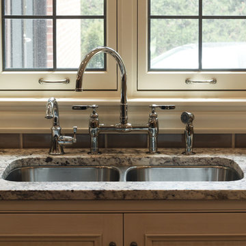 Polished Nickel Bridge Faucet with Sprayer and Insta Hot Faucet