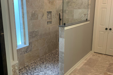 Example of a large trendy master ceramic tile, multicolored floor and double-sink bathroom design in Houston with gray walls, granite countertops and a built-in vanity