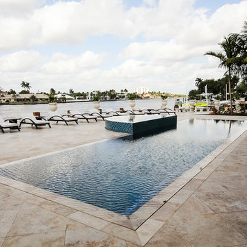 Wet Edge Pool with Custom Tiled Spa and Laminar Deck Jets in Fort Lauderdale Fl.