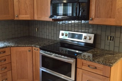 Example of an arts and crafts kitchen design in Boston