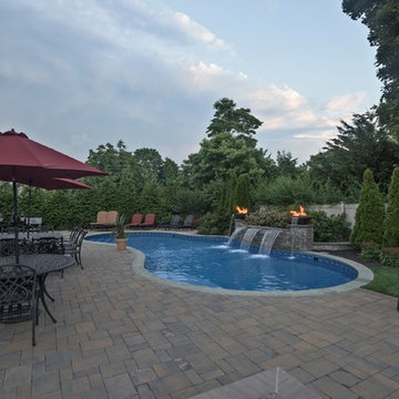 Custom swimming pool with water feature