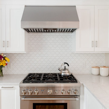 White Transitional Kitchen, Dining and Sunroom Renovation