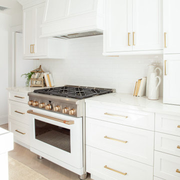 All White Transitional Kitchen with Herringbone Wood Floor
