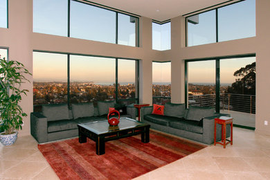 Minimalist open concept limestone floor living room photo in San Francisco with gray walls