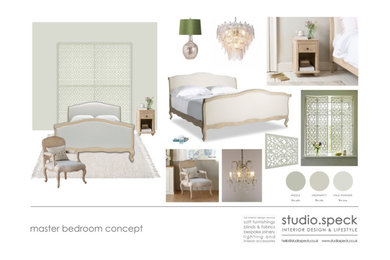 Design ideas for a medium sized country master bedroom in Oxfordshire with green walls, carpet, beige floors and panelled walls.