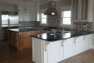 Example of a classic kitchen design in Other