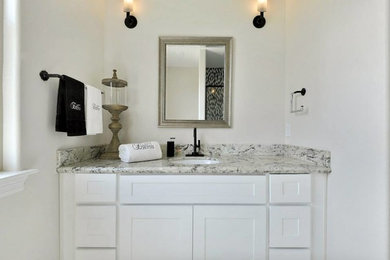 Large minimalist master bathroom photo in New Orleans with a drop-in sink, furniture-like cabinets and white cabinets