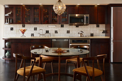 Eat-in kitchen - small 1950s single-wall dark wood floor and black floor eat-in kitchen idea in New York with glass-front cabinets, dark wood cabinets, multicolored backsplash, stainless steel appliances, ceramic backsplash, an undermount sink, concrete countertops and beige countertops