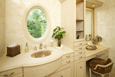 Photo of a large master bathroom in New York with furniture-like cabinets, light wood cabinets, an open shower, a two-piece toilet, porcelain tile, multi-coloured walls, ceramic floors, a console sink and wood benchtops.