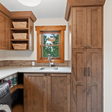 Laundry relocated from main floor mudroom to upper floor