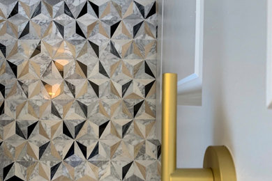 Inspiration for a modern powder room remodel in Miami