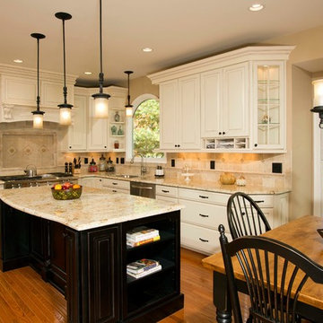 Custom Cabinets, Arched Windows and Doors Provide This Kitchen Its Character