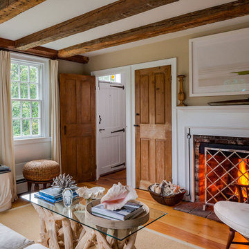 Cottage Living room with restored wooden beams & fireplace - Cranberry Cottage