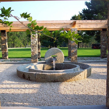 meditation garden with reclaimed olive press fountain
