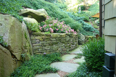 Inspiration for a large asian shade side yard stone garden path in New York.