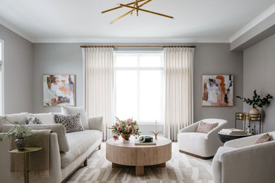Inspiration for a large transitional open concept family room in Chicago with grey walls, medium hardwood floors and brown floor.