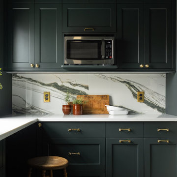 Custom Kitchen Rebuild: Dark Cabinetry, Quartz, and a Record Room Below