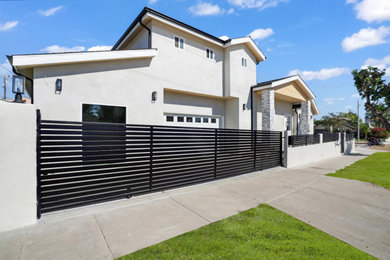 Inspiration for a large white house exterior remodel in Los Angeles