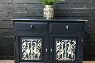 Upcycled sideboard/buffet in dark navy, and wallpapered door fronts