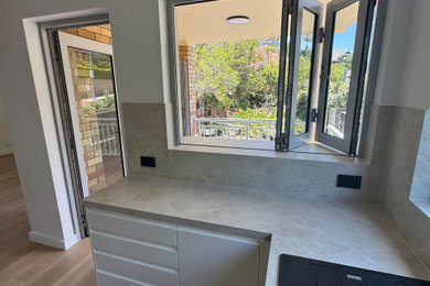 Photo of a contemporary home design in Sydney.