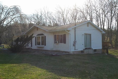 Example of a classic exterior home design in Other