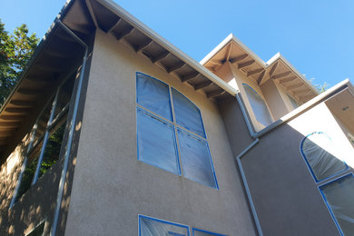 Southwestern exterior home idea in Portland