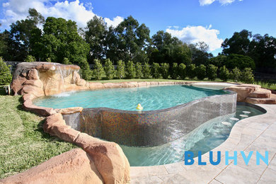 Custom-shaped pool in Sydney with tile.