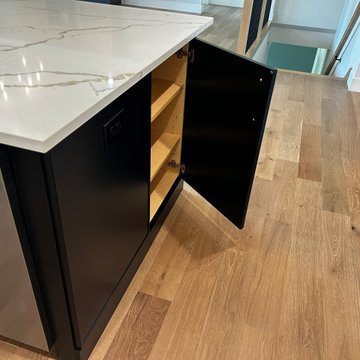 Maple Pecan Stain and Painted Black Kitchen Design in Bettendorf, Iowa