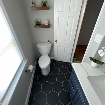 Bathroom Remodeling in Washington DC with Blue cabinet and Quartz countertop