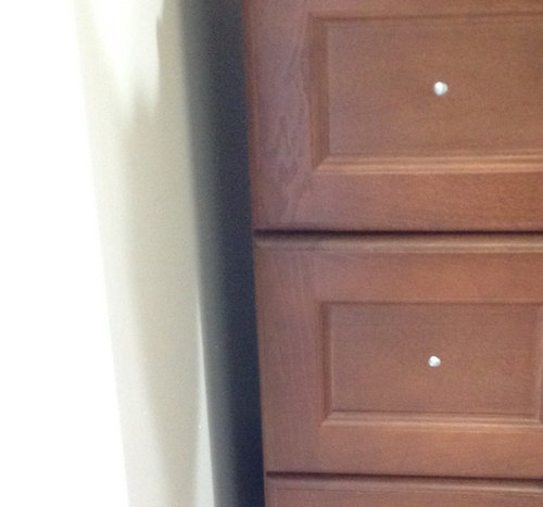 The Gap Between Wall And Vanity Cabinet, How To Fill Gap Between Kitchen Cabinet And Wall