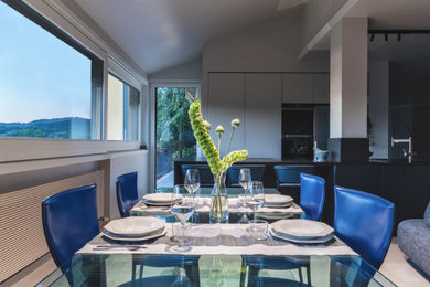 Dining room - modern dining room idea in Turin