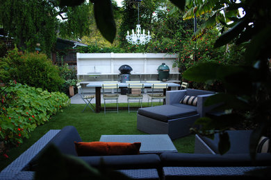 Photo of a small transitional backyard patio in San Francisco with an outdoor kitchen and concrete slab.