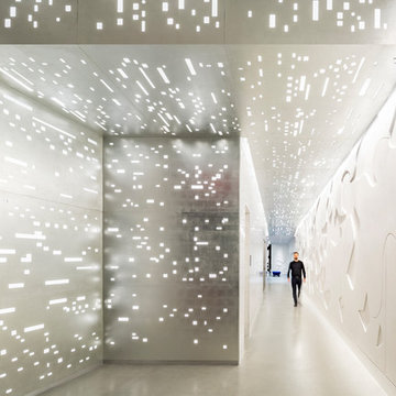 Lobby with custom gilded light panels and relief wall panels