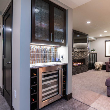 Modern Windowless Lower Level Media and Family Room Featuring "Faux Windows"