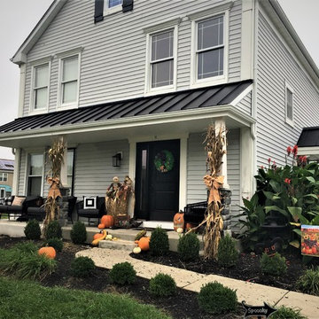 Installing Matte Black Standing Seam Metal Roof and Replacing Pillars with Porch