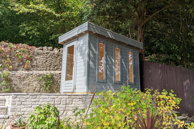 This is an example of a small contemporary garden shed and building in Wiltshire.