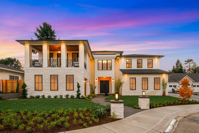 Huge modern white two-story house exterior idea in Portland with a shingle roof and a brown roof