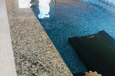 Example of a mountain style pool design in Other
