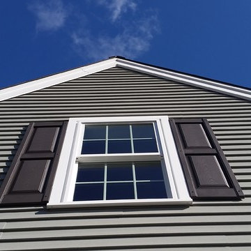 Home Addition in Fairhaven, MA features second floor, breezeway, and garage.