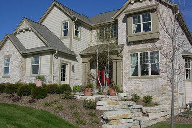 Traditional exterior home idea in Milwaukee