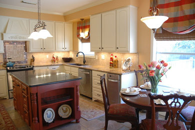 Example of a tuscan kitchen design in Houston