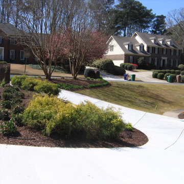 Tate SInkhole Repair next to House & Garage