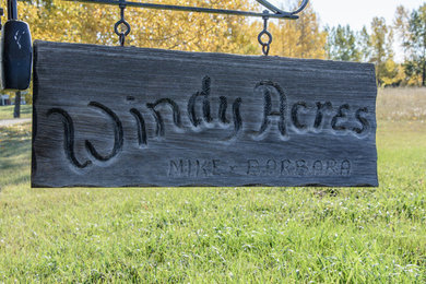 Farmhouse home design photo in Calgary