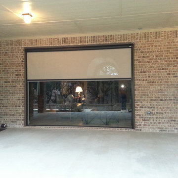 Motorized drop screen