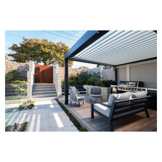 Outdoor oasis in Kohimarama - Midcentury - Sunroom - Auckland - by ...