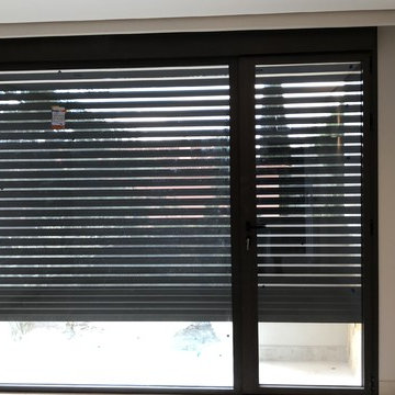 VIVIENDA UNIFAMILIAR instalacion de carpinteria de aluminio TECNHAL
