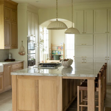 Custom White Oak Kitchen Island with Built-In Gas Cooktop & Two-Tone Millwork