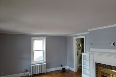 Textured Plaster, Smooth Surface Ceiling, and New Paint